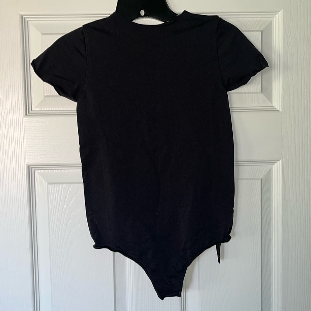 Skims Short Sleeve Black Bodysuit. Size S/M.